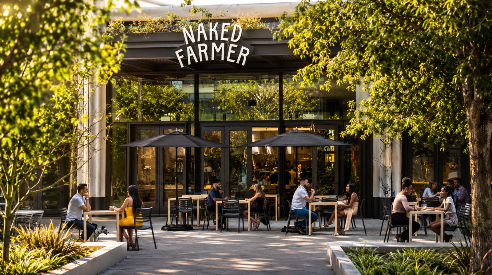 Naked Farmer storefront with guests dining on the patio